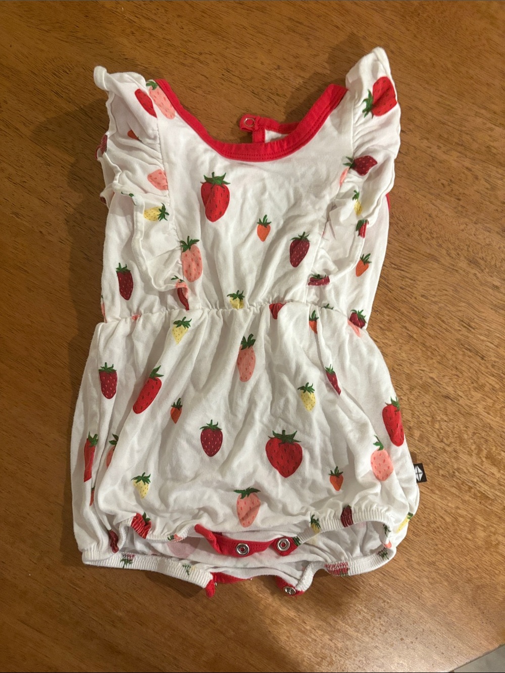 Kyte BABY White Strawberry Print Ruffle Romper with Red Trim